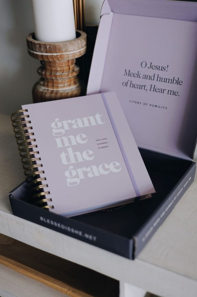 light purple planner with the words Grant me the Grace